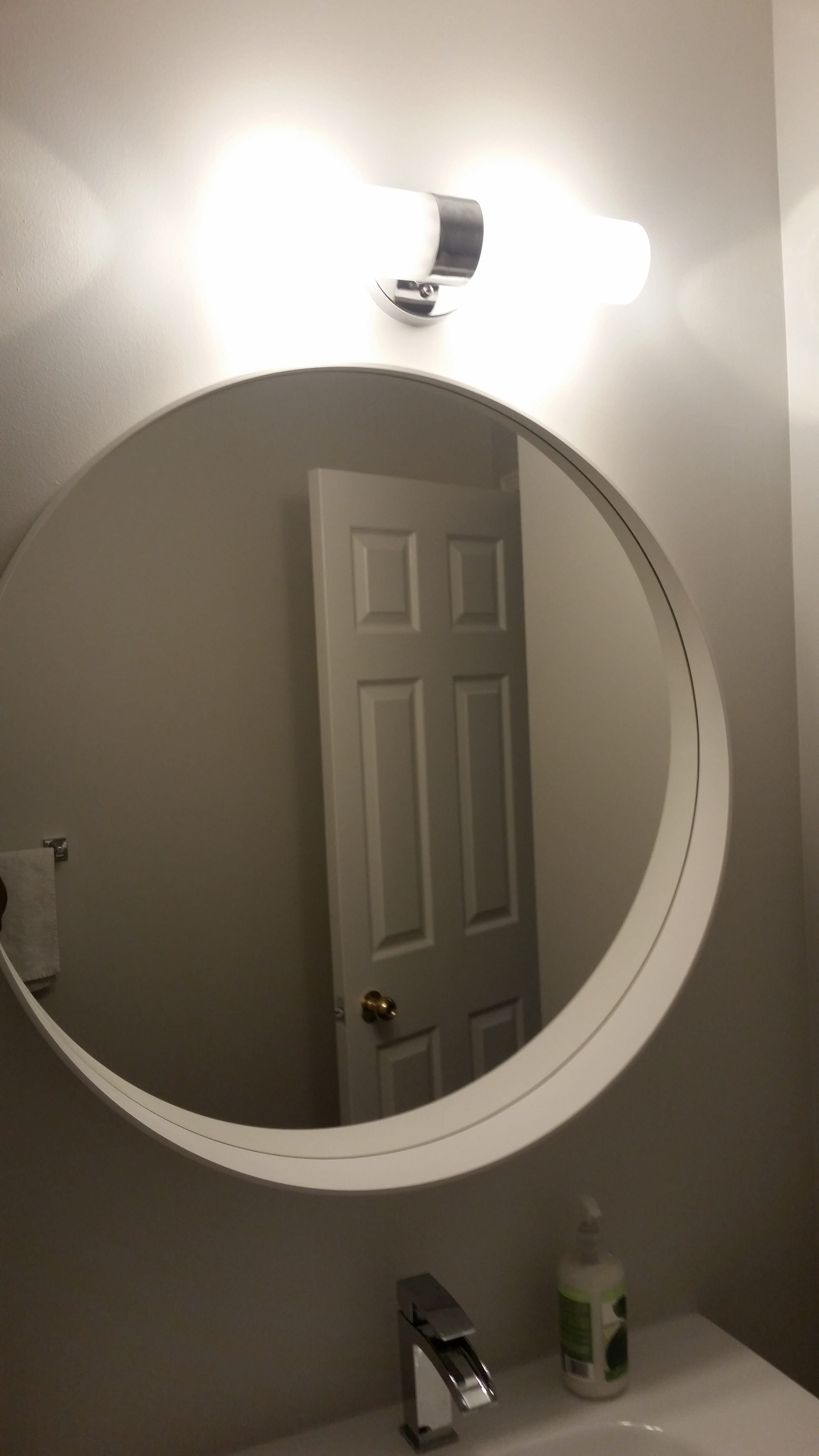 bathroom light not centered over mirror